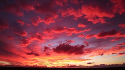 What Causes Red Sunsets and Orange Storm Clouds